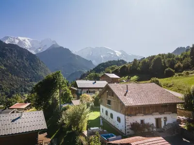 an aerial view of a house with mountains in the background at Wanderful Life MontBlanc refuge haut de gamme in Saint-Gervais-les-Bains