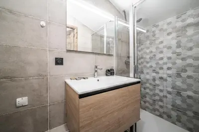 a bathroom with a sink and a shower at Kotibé Chamonix - BY EMERALD STAY in Chamonix-Mont-Blanc