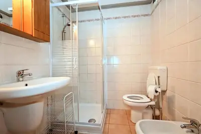 a bathroom with a sink and a toilet and a shower at Résidence Les Sapins - Les Sapins 2 MAE-0514 in Les Houches