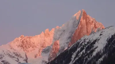 a large mountain with snow on it at Les Aiguilles du Brevent - Grand Appt Renove - Central - Terrasse avec Vue in Chamonix-Mont-Blanc