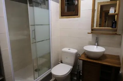 a bathroom with a toilet and a sink and a shower at Les Chalet Du Soleil - Chalets du Soleil 9 MAE-6344 in Saint-Gervais-les-Bains