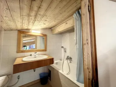 a bathroom with a sink and a shower and a tub at Superbe 3 Pièces avec Balcons en Plein Cœur de Combloux - Parking, Wifi, Lave-linge - FR-1-560-106 in Combloux