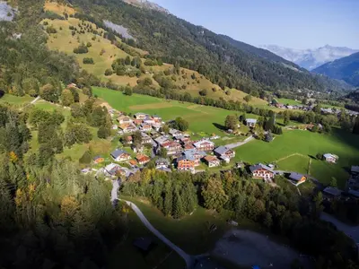 an aerial view of a small village in the mountains at Chalet Nant Rouge in Les Contamines-Montjoie