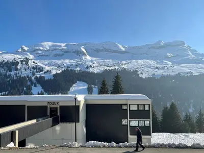 a living room with a couch and a table at Studio Confortable au Centre de Flaine avec Balcon - FR-1-425-200 in Arâches-la-Frasse