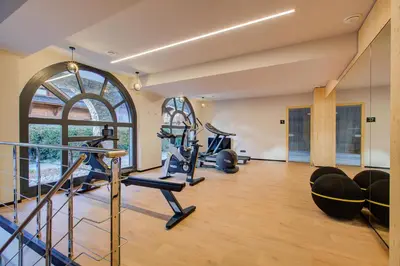 an image of a gym with treadmills and ellipticals at Apartment Chéserys, Alpes Travel, Les Praz Sleeps 2-4 in Chamonix-Mont-Blanc