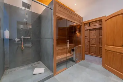 a bathroom with a walk in shower and a shower stall at Spacious 3-bed in the heart of Chamonix with sauna in Chamonix-Mont-Blanc