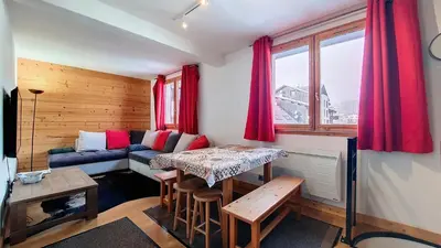 a living room with a couch and a table at Aiguille Rouge in Chamonix-Mont-Blanc