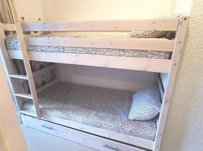 a set of bunk beds in a room at Super appartement Cocooning vu Mont Blanc in Sallanches