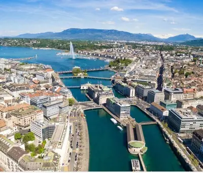 an aerial view of a city with a river and buildings at Super appartement Cocooning vu Mont Blanc in Sallanches