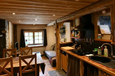 a kitchen with a sink and a counter top at Les Posettes, chalet vallée de Chamonix - Mont Blanc by ImmoConciergerie in Vallorcine