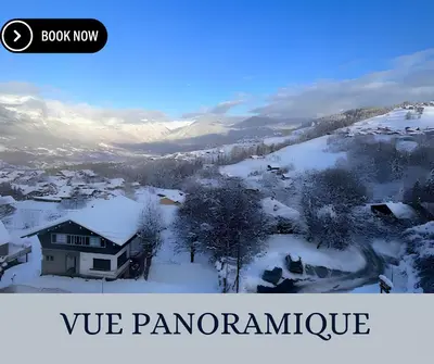 a house in the snow with the words we panamciplinary at Vue Mont blanc, ski et village in Combloux