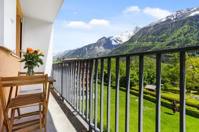 a balcony with a view of mountains at Apartment Le Panoramic in Chamonix-Mont-Blanc