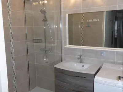 a bathroom with a shower and a sink at Chalet Monte-Pente in Megève