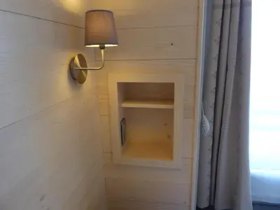 a tiny house with a small niche in the wall at Chalet Monte-Pente in Megève