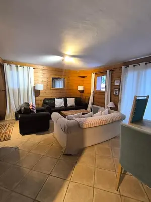 a living room with two couches and a couch at Chalet Cannon- Mountain Getaway in Les Contamines-Montjoie