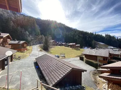 an aerial view of a village with a mountain at Chalet Cannon- Mountain Getaway in Les Contamines-Montjoie