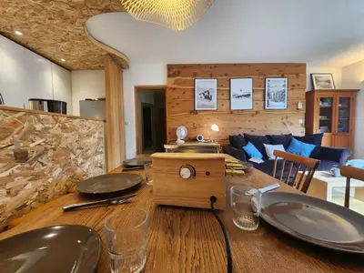 a large room with several tables and pool tables at Appartement RDC 3 pièces avec parking et animaux acceptés - FR-1-629-130 in Samoëns