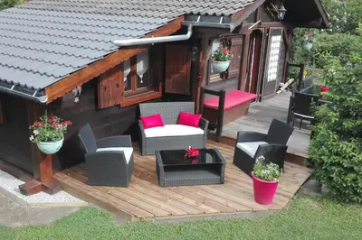 an aerial view of a deck with chairs and a house at Mazot le Petit Drus in Chamonix-Mont-Blanc