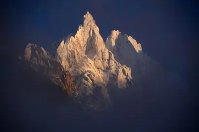 a view of a tall mountain in the sky at Mazot le Petit Drus in Chamonix-Mont-Blanc