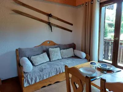 a small kitchen with a table in a tiny house at Studio La Jacquerie by Interhome in Demi-Quartier