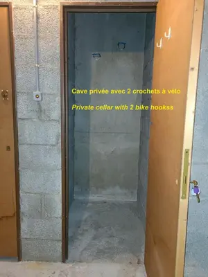 a glass door with a sign that says cave privilegeagencyagency encounters a value at Studio cosy de 23 m2 à la montagne in Samoëns