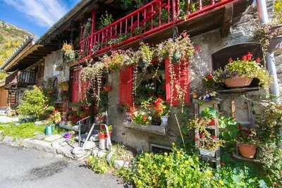 a village covered in snow in the mountains at Résidence Igloo 3 ski in-ski out - Happy Rentals in Le Tour
