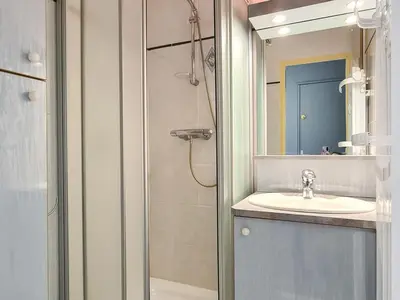 a bathroom with a sink and a shower at Studio rénové avec cabine à Flaine, balcon ensoleillé - FR-1-425-201 in Arâches-la-Frasse