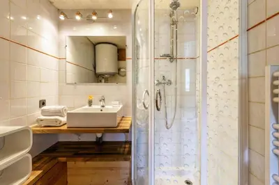 a bathroom with a shower and a sink at Appartement Rochebrune De Megève 32 - Happy Rentals in Megève