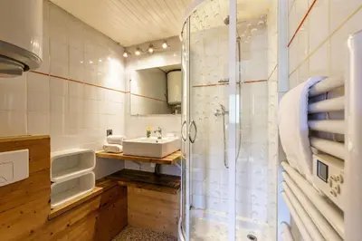 a bathroom with a shower and a sink at Appartement Rochebrune De Megève 32 - Happy Rentals in Megève