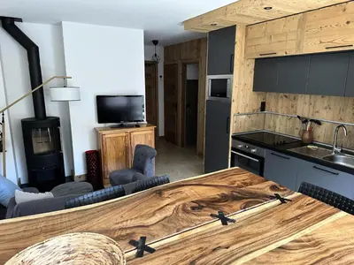 a kitchen with a wooden counter top in a room at Résidence La Cry - Appartement 3 pièces - 6 personnes Vue Mont-Blanc MAE-5604 in Combloux