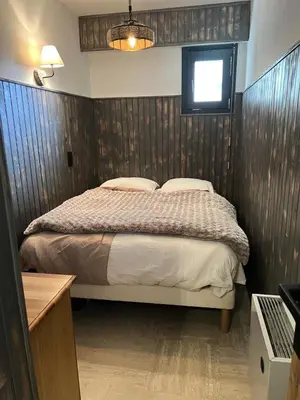 a bedroom with a bed and a window on the wall at Résidence La Cry - Appartement 3 pièces - 6 personnes Vue Mont-Blanc MAE-5604 in Combloux