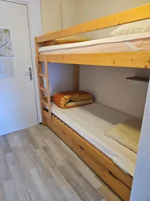 a bunk bed room with two bunk beds in it at Aux Pieds des pistes en plein soleil in Les Contamines-Montjoie