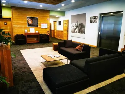 a living room with couches and a coffee table at French Alps Luxury in Vallorcine