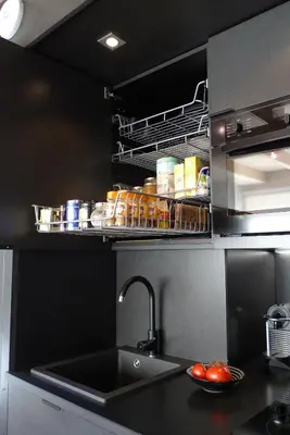 a kitchen with a sink and a counter top at Chalet*** au pied d'une prairie face à la montagne in Sixt