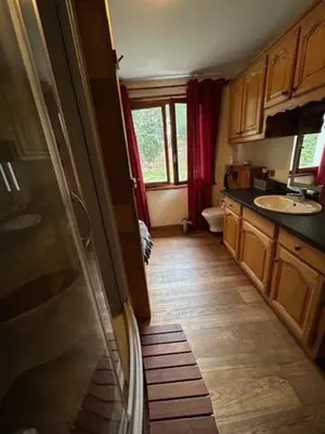 a small bathroom with a sink and a toilet at les loges de l'Arpenaz in Magland