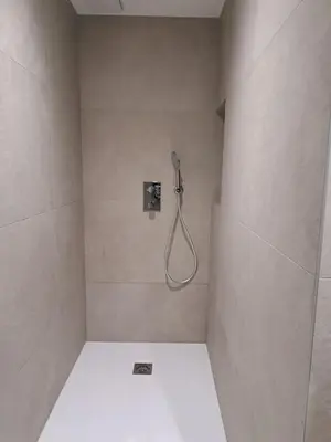 a bathroom with a toilet and a sink at La spatule in Flaine