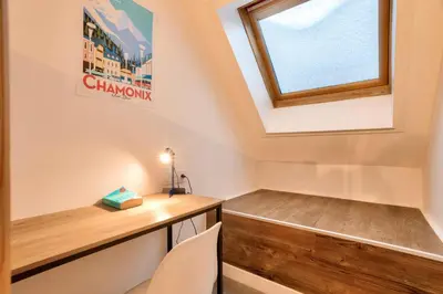 a small room with a desk and a window at L'Aiguille - maeva Home - 2 Pièces 4 Personnes Prestige MAE-0414 in Chamonix-Mont-Blanc