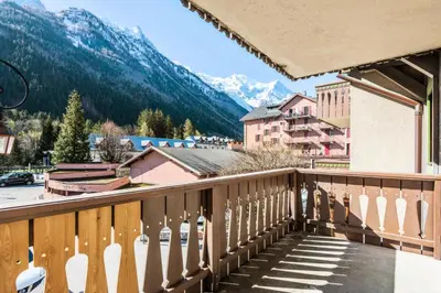 a balcony with a view of the mountains at Résidence La Ginabelle - maeva Home - 4 Pièces 6 Personnes - Prestige MAE-1506 in Chamonix-Mont-Blanc