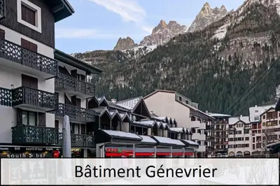 a group of buildings in front of a mountain at L'Aiguille - maeva Home - Appartement 2 pièces 4 personnes Exclusive MAE-1386 in Chamonix-Mont-Blanc