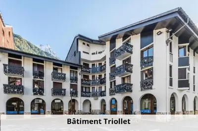 a building with balconies on the side of it at L'Aiguille - maeva Home - Appartement 2 pièces 4 personnes Exclusive MAE-1386 in Chamonix-Mont-Blanc