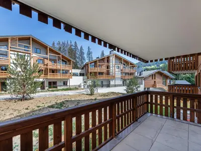 a view from the balcony of a resort at Spacieux appartement pour familles près du centre avec parking - FR-1-569-85 in Megève