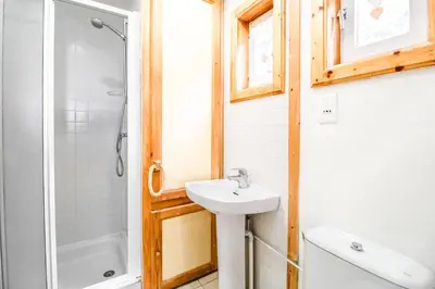 a bathroom with a sink and a shower at Charming 4-bed Chalet, Mountain Views, Double Garage in Flaine