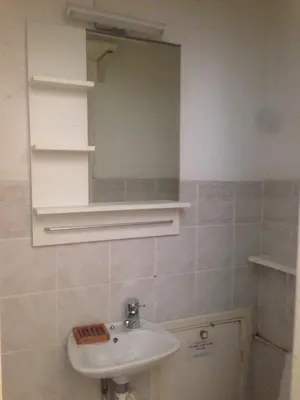 a bathroom with a sink and a mirror at Appartment Aiguille Du Midi in Chamonix-Mont-Blanc