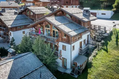 an overhead view of a large house with wooden at Chalet Purdey Combloux - BY EMERALD STAY in Combloux