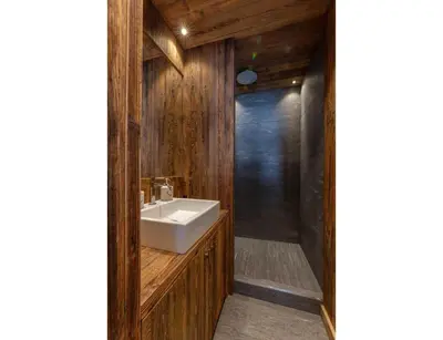 a bathroom with a sink and a shower at Modern 2 bedroom apartment, close to ski lifts in Megève