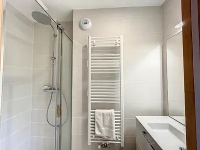 a bathroom with a shower and a sink at Appartement neuf avec vue Mont Blanc, parking et wifi à Combloux - FR-1-560-113 in Combloux