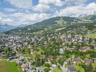 an aerial view of a town in the mountains at Appartement moderne 3 chambres à Megève avec garage - FR-1-569-131 in Megève