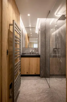 a bathroom with a shower and a sink at L'Ecrin Blanc Megève in Megève