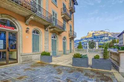 a building with some plants in front of it at Appartement Yodel - Welkeys in Saint-Gervais-les-Bains