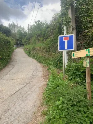 a street sign on the side of a road at Chalet le jardin de fées in Saint-Gervais-les-Bains